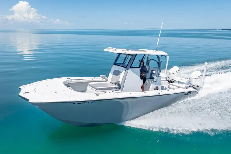  Yacht Photos Pics 2022 Costa Custom Boats 264 cruising on clear blue water.