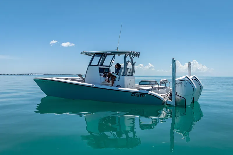  Yacht Photos Pics 2022 Costa Custom Boats 264 on calm blue water under clear sky.