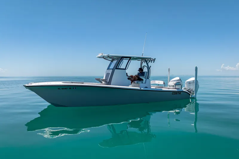  Yacht Photos Pics 2022 Costa Custom Boats 264 on calm blue water under clear sky.