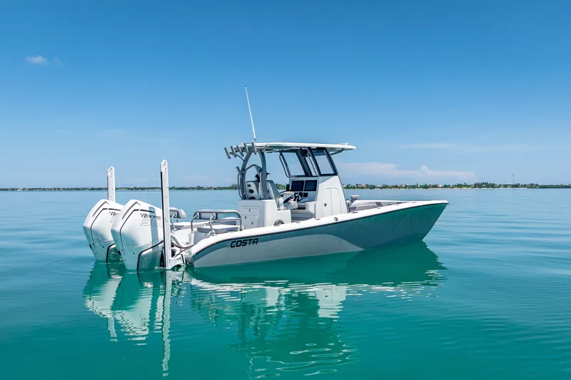  Yacht Photos Pics 2022 Costa Custom Boats 264 on calm blue water under clear sky.