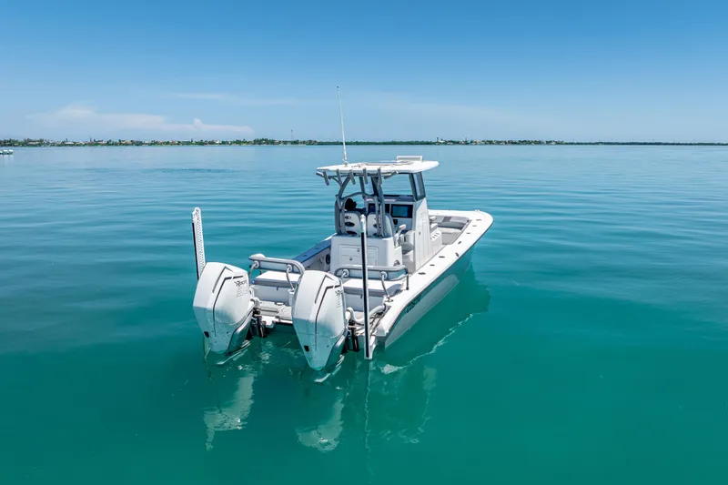  Yacht Photos Pics 2022 Costa Custom Boats 264 on calm blue water, showcasing twin engines.