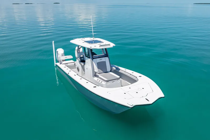  Yacht Photos Pics 2022 Costa Custom Boats 264 on calm turquoise water, showcasing sleek design and modern features.