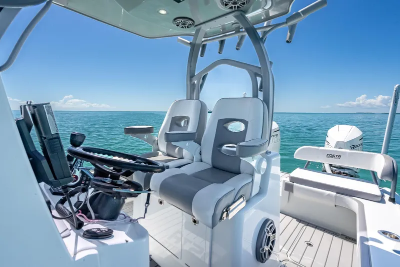  Yacht Photos Pics 2022 Costa Custom Boats 264 interior with dual seats and ocean view.