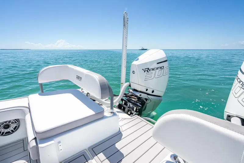  Yacht Photos Pics 2022 Costa Custom Boats 264 with Racing 300 engines on clear blue water.