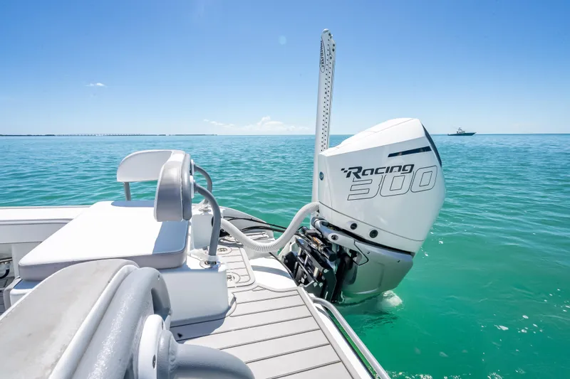  Yacht Photos Pics 2022 Costa Custom Boats 264 with Racing 300 engine on clear blue water.