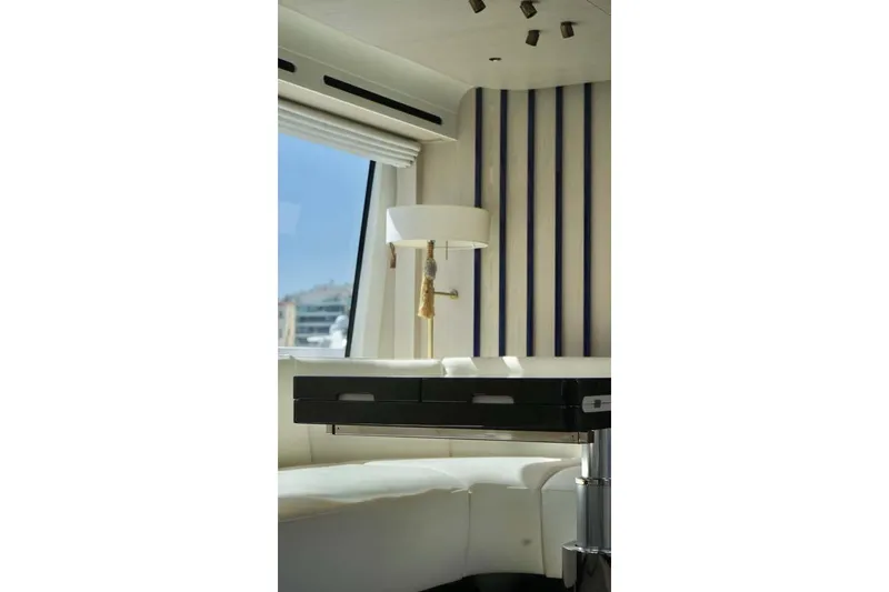 Koko Yacht Photos Pics Luxurious interior of 2023 Azimut Fly 78 yacht with modern decor and elegant furnishings.