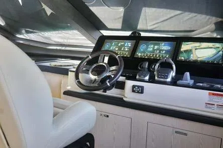 Koko Yacht Photos Pics 2023 Azimut Fly 78 yacht cockpit with modern navigation displays and controls.