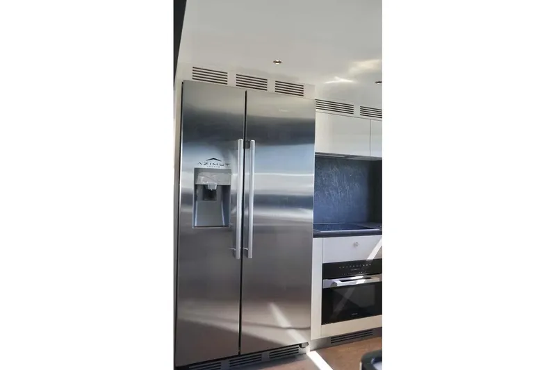 Koko Yacht Photos Pics Modern kitchen in 2023 Azimut Fly 78 yacht with stainless steel appliances.