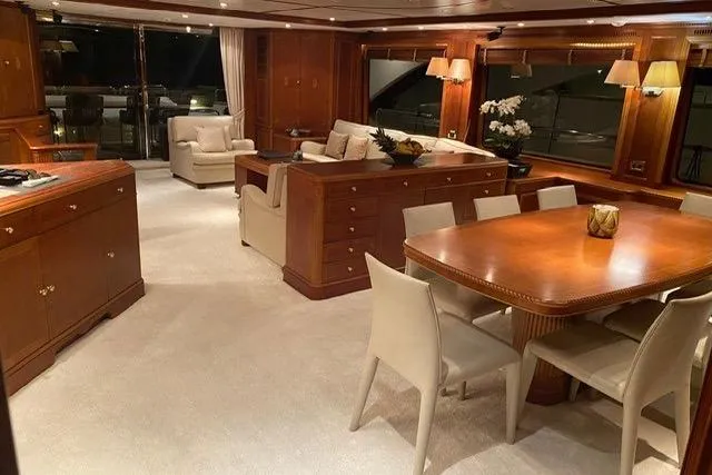  Yacht Photos Pics Luxurious interior of 2004 Benetti Tradition 100 yacht with elegant dining and seating area.