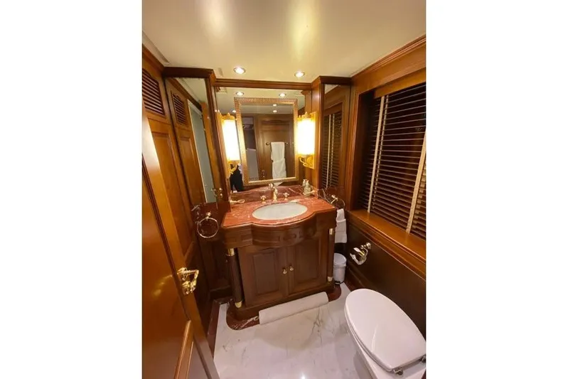  Yacht Photos Pics Luxurious bathroom on 2004 Benetti Tradition 100 yacht with elegant wood and marble finishes.
