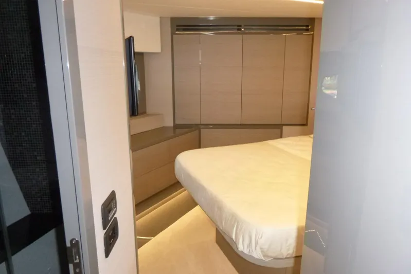 Habeas Orcas Yacht Photos Pics Luxurious bedroom interior of 2020 Pershing 62 yacht with modern design elements.