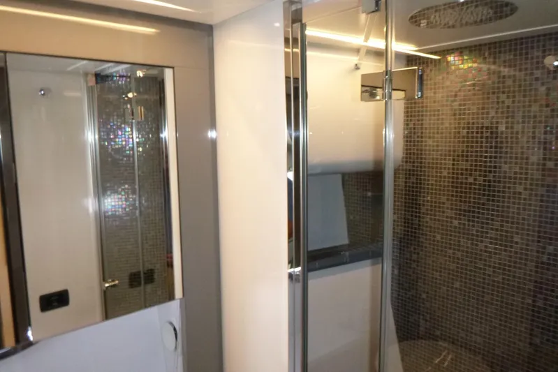 Habeas Orcas Yacht Photos Pics Luxurious bathroom interior of 2020 Pershing 62 yacht with modern shower design.