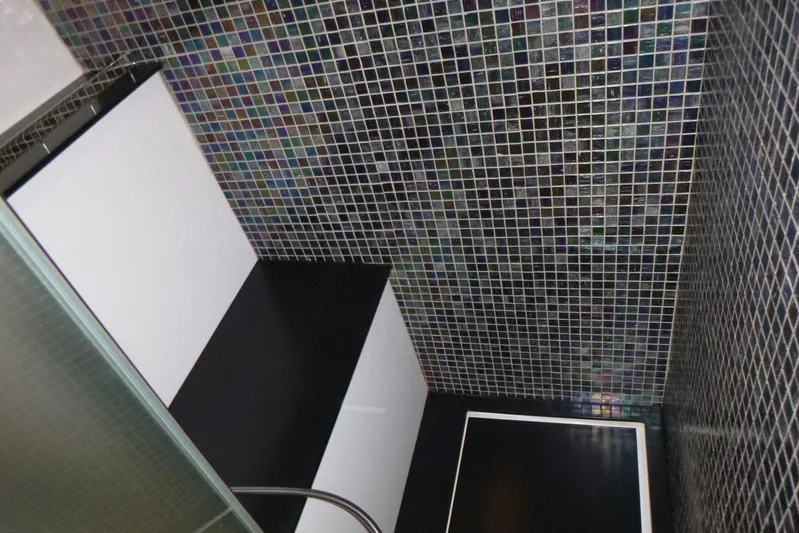 Habeas Orcas Yacht Photos Pics Luxurious Pershing 62 yacht interior with mosaic tile walls, modern design, 2020 model.