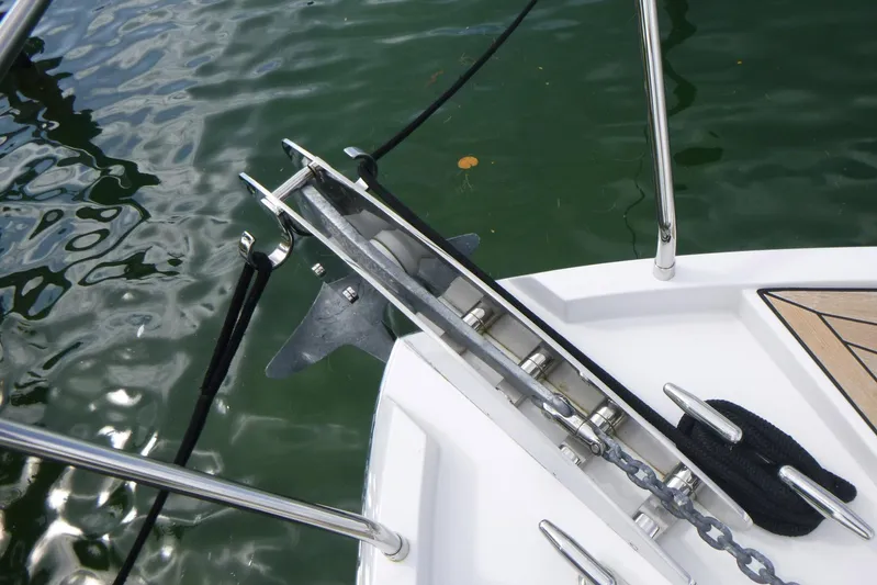 Habeas Orcas Yacht Photos Pics Anchor and chain on a 2020 Pershing 62 yacht, docked in calm water.