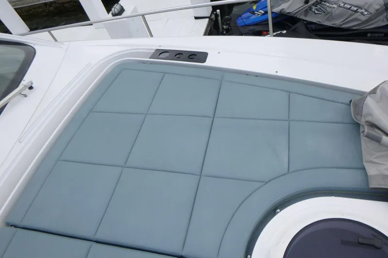 Habeas Orcas Yacht Photos Pics Sunpad on 2020 Pershing 62 yacht, featuring sleek design and comfortable seating.