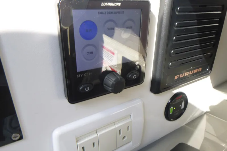 Habeas Orcas Yacht Photos Pics Control panel on a 2020 Pershing 62 yacht with Lumishore and Furuno systems.