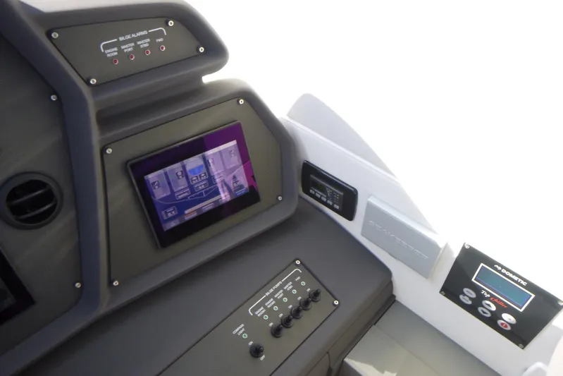 Habeas Orcas Yacht Photos Pics Control panel of a 2020 Pershing 62 yacht, featuring advanced navigation and monitoring systems.