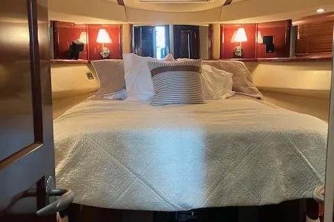 Yacht Photos Pics Luxurious bedroom interior of 2007 Sea Ray 52 Sedan Bridge yacht.