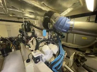  Yacht Photos Pics Engine room of 2007 Sea Ray 52 Sedan Bridge yacht, showcasing mechanical components.