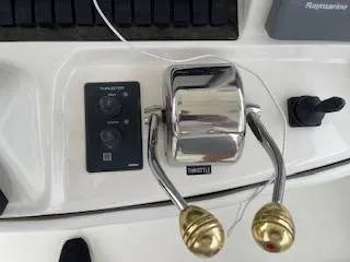  Yacht Photos Pics Throttle controls on a 2007 Sea Ray 52 Sedan Bridge yacht dashboard.
