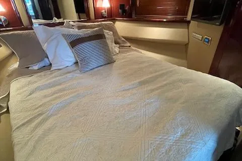  Yacht Photos Pics Luxurious bedroom interior of 2007 Sea Ray 52 Sedan Bridge yacht.