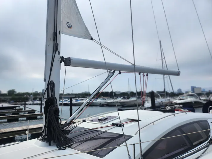 Vilia Yacht Photos Pics Sailboat Jeanneau 45DS 2010 docked at marina with visible mast and rigging.