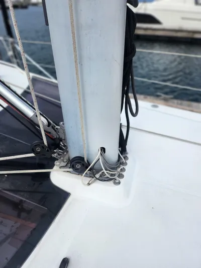 Vilia Yacht Photos Pics Mast base of 2010 Jeanneau 45DS sailboat with rigging and ropes at dock.