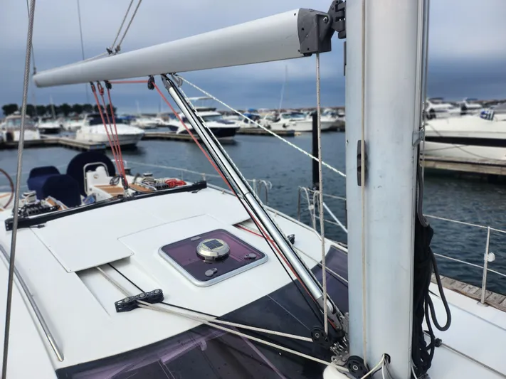 Vilia Yacht Photos Pics Jeanneau 45DS sailboat deck and mast at marina, 2010 model.