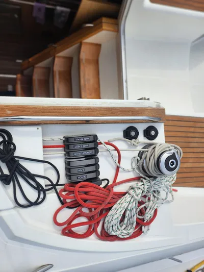 Vilia Yacht Photos Pics Sailing equipment on a 2010 Jeanneau 45DS yacht, featuring ropes and winches.