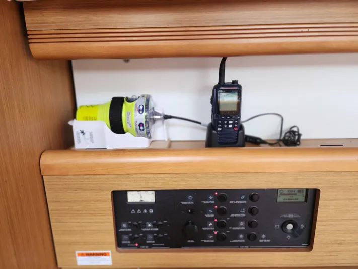 Vilia Yacht Photos Pics Control panel and communication devices on a 2010 Jeanneau 45DS yacht interior.