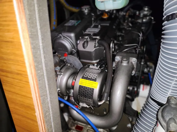 Vilia Yacht Photos Pics Engine compartment of a 2010 Jeanneau 45DS sailboat, showcasing detailed mechanical components.