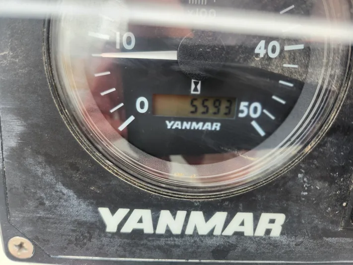 Vilia Yacht Photos Pics Yanmar engine gauge displaying 5593 hours on Jeanneau 45DS, 2010 model.