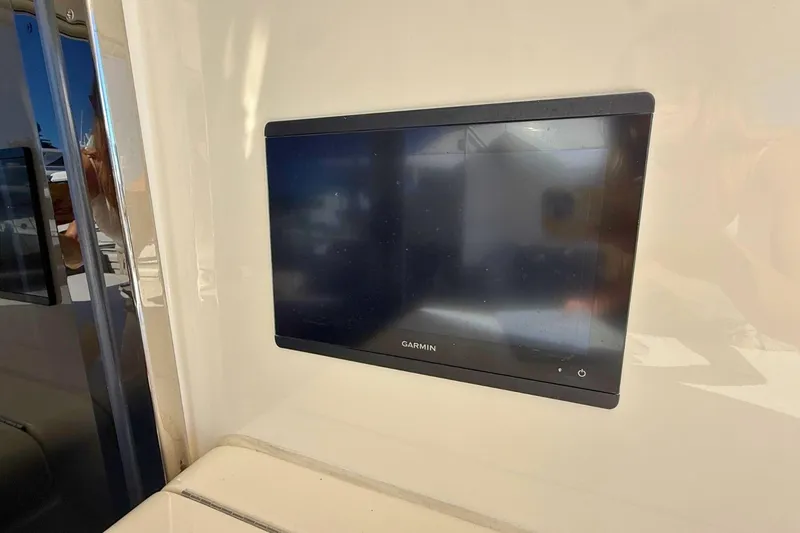 Buzz Yacht Photos Pics Garmin display on 2020 Riviera 57 Enclosed Flybridge yacht interior.