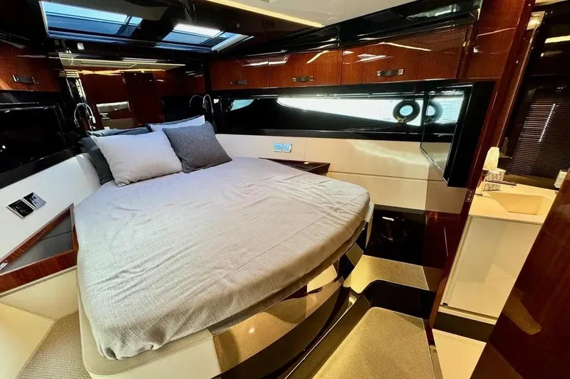 Yacht Photos Pics Luxurious cabin interior of 2021 Riva 56' Rivale yacht with modern design.