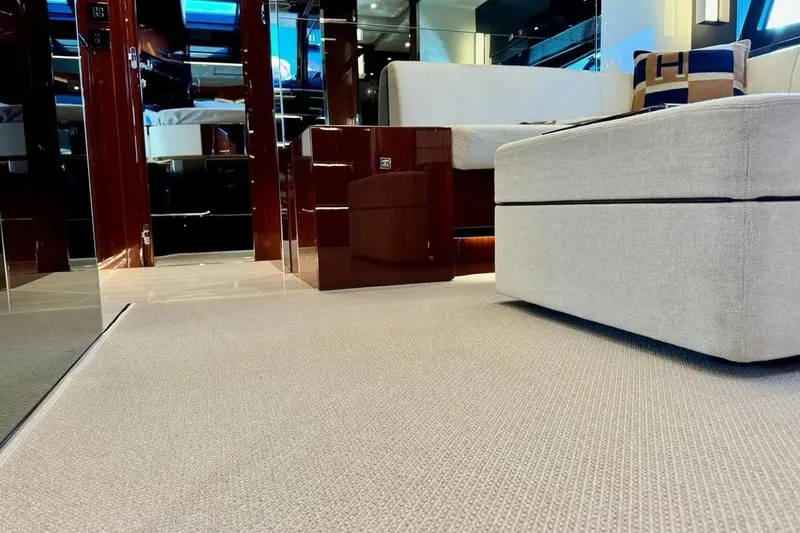  Yacht Photos Pics Luxurious interior of 2021 Riva 56' Rivale yacht with modern furnishings and elegant design.