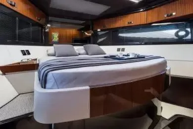  Yacht Photos Pics Luxurious interior of 2021 Riva 56' Rivale yacht with modern bedroom design.