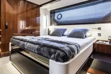  Yacht Photos Pics Luxurious bedroom interior of 2021 Riva 56' Rivale yacht with modern design.