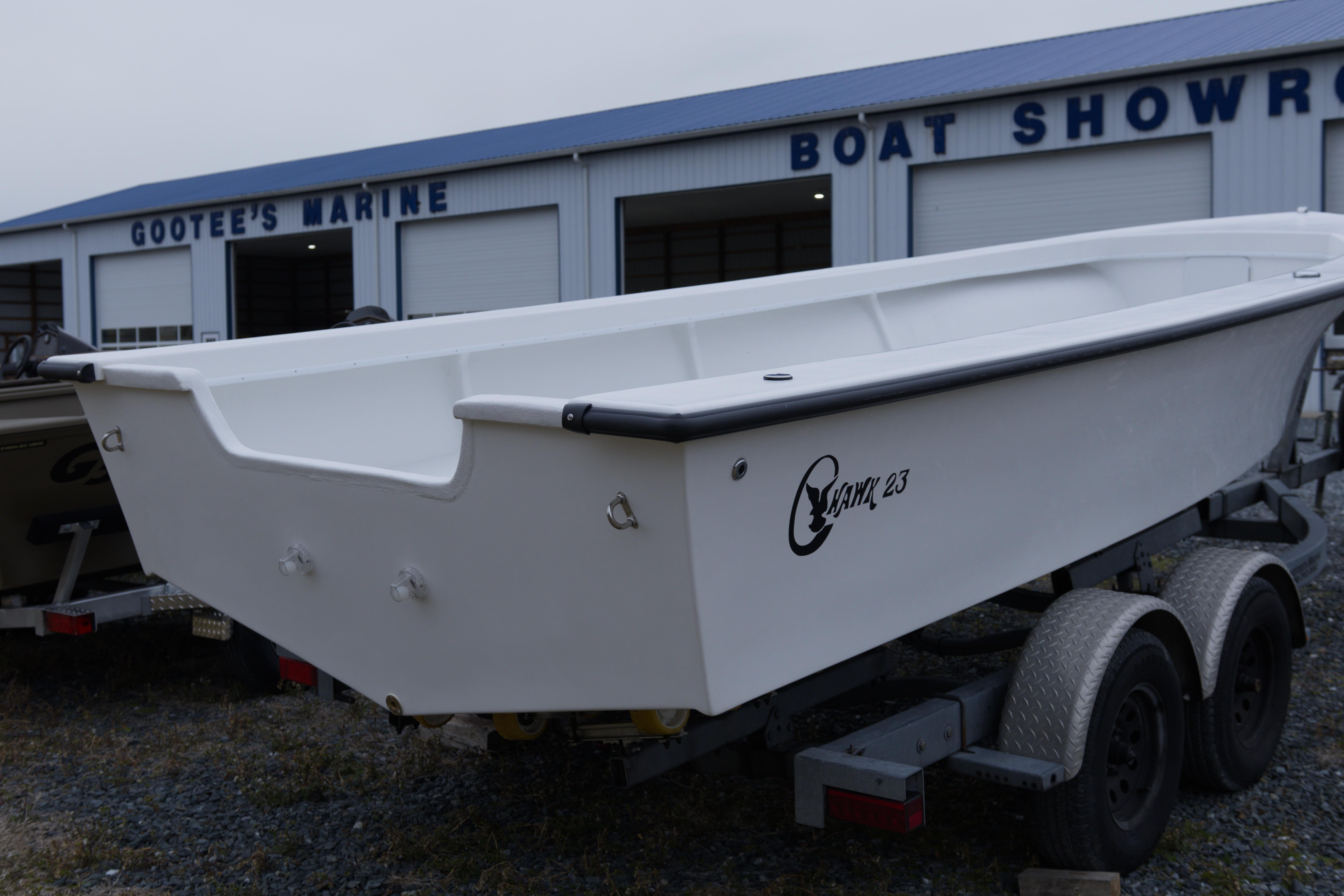 2026 C-Hawk 23 Commercial boat on trailer at Gootee's Marine showroom.