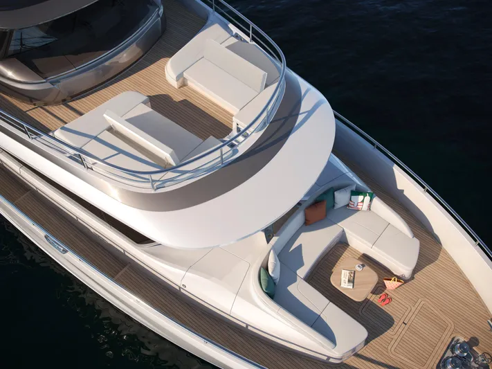  Yacht Photos Pics Luxurious 2025 Princess X80 yacht deck with elegant seating and modern design.
