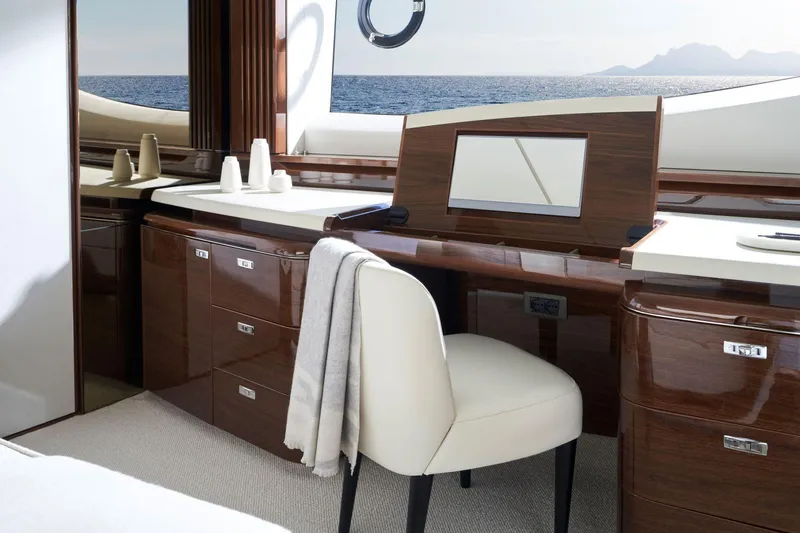  Yacht Photos Pics Luxurious interior of 2025 Princess X80 yacht with elegant wood finish and ocean view.