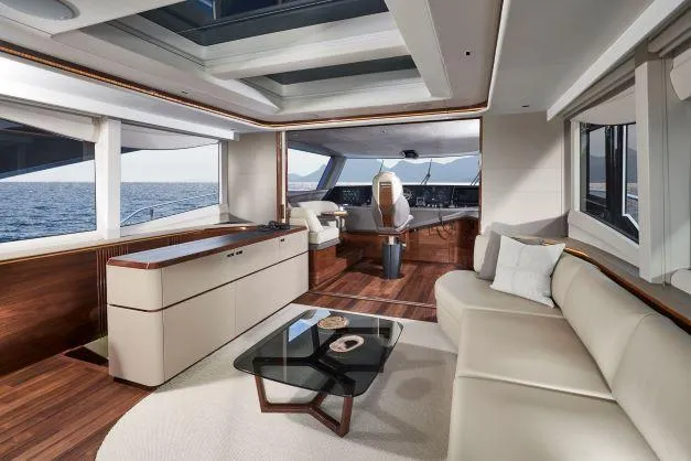  Yacht Photos Pics Luxurious interior of 2025 Princess X80 yacht with modern furnishings and ocean view.