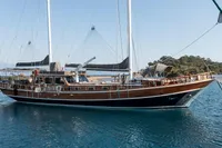 Aganlar Custom Motorsailer Gulet 2003 sailing on calm blue waters.