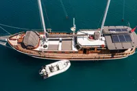 Aerial view of 2003 Aganlar Custom Motorsailer Gulet with solar panels and tender boat.