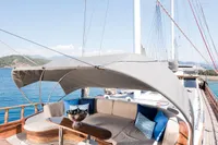 Luxurious 2003 Aganlar Custom Motorsailer Gulet with elegant deck seating and canopy.