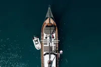 Aerial view of 2003 Aganlar Custom Motorsailer Gulet on calm blue water.