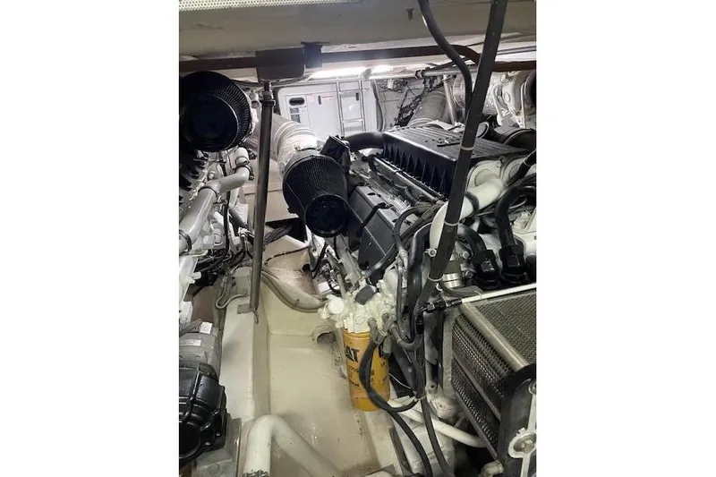  Yacht Photos Pics Engine room of a 2005 AB 88 model, showcasing complex machinery and components.