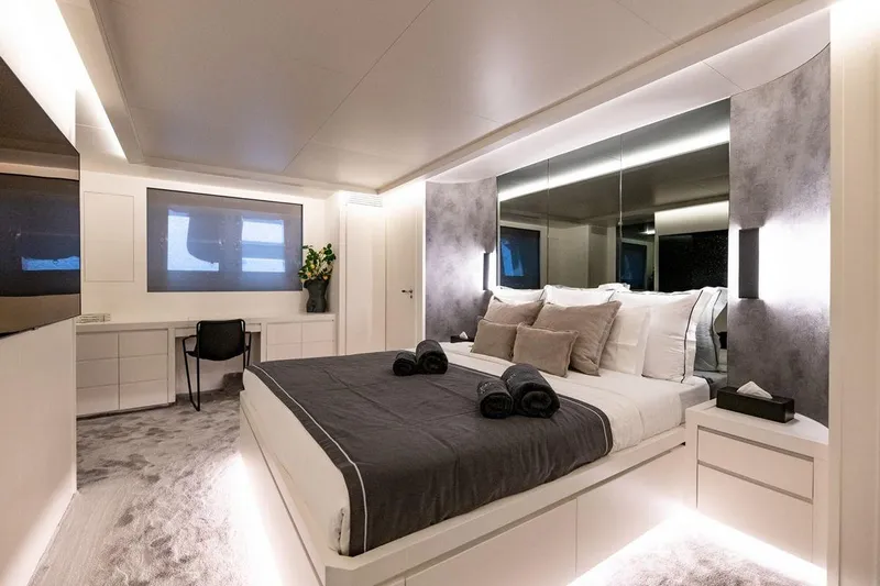 Eva Yacht Photos Pics Luxurious bedroom interior on Tecnomar Velvet 36 EVA yacht, featuring modern design and elegant decor.