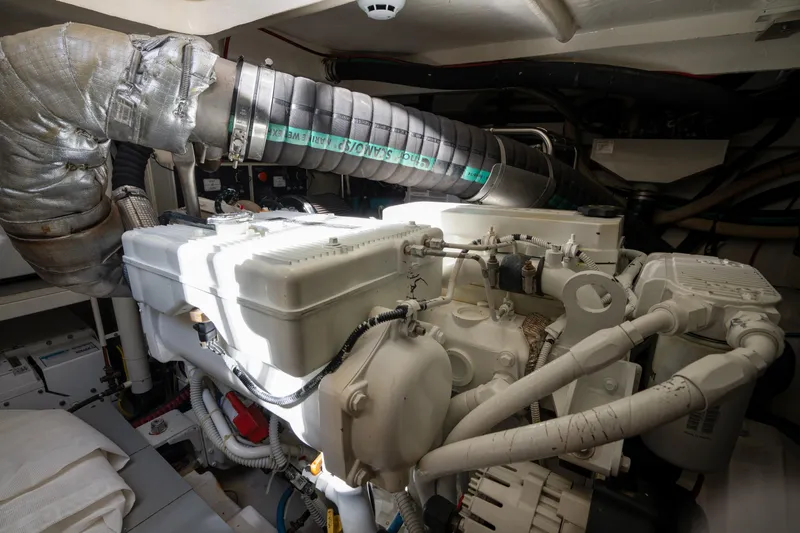  Yacht Photos Pics Engine room of 2018 Ferretti Yachts 450 fly, showcasing mechanical components and piping.