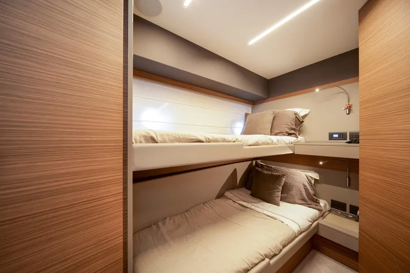  Yacht Photos Pics Luxurious cabin with bunk beds in 2018 Ferretti Yachts 450 fly.