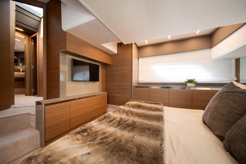  Yacht Photos Pics Luxurious interior of 2018 Ferretti Yachts 450 fly, featuring elegant wood finishes and modern design.